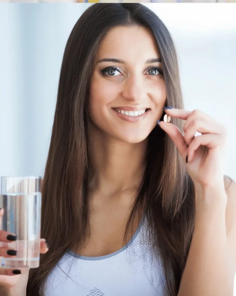 A woman taking the best hunger suppressant pills